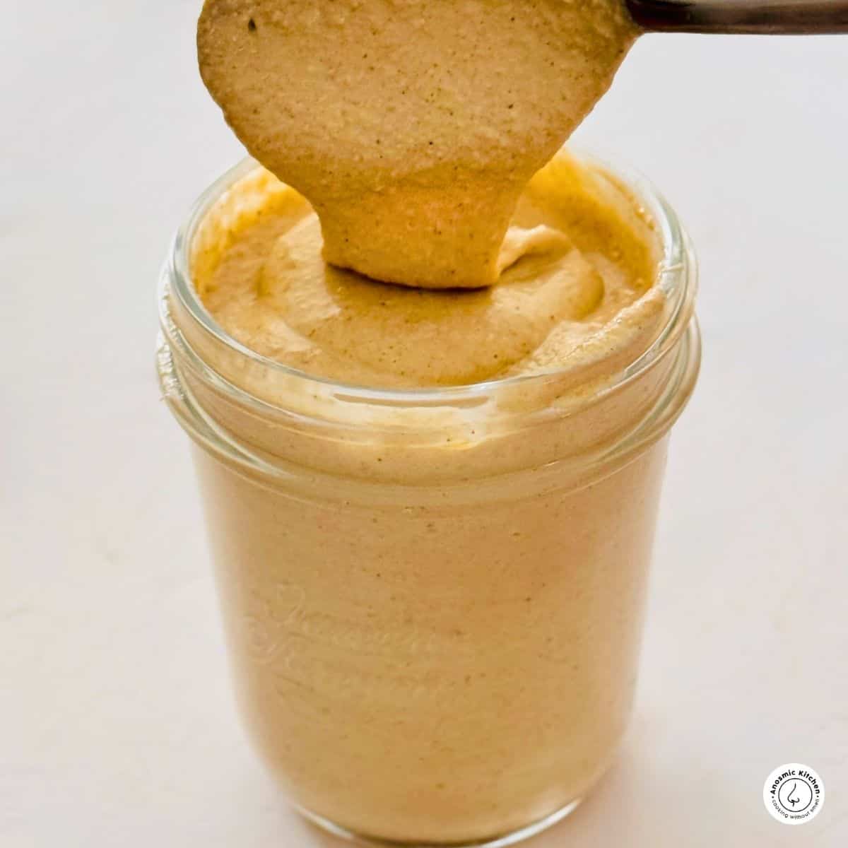 tahini in a mason jar 3-ingredient homemade tahini recipe