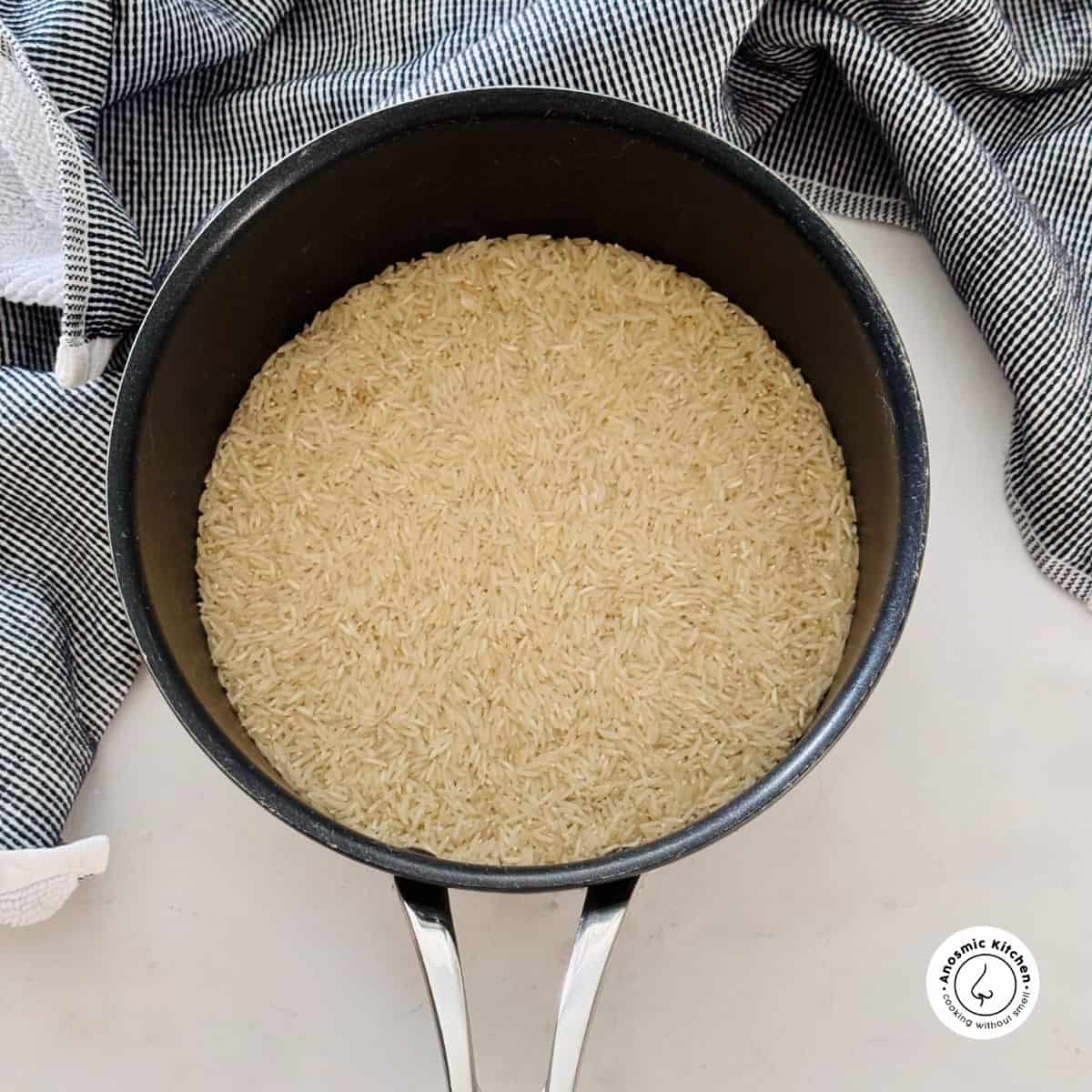 dry uncooked rice in a pot