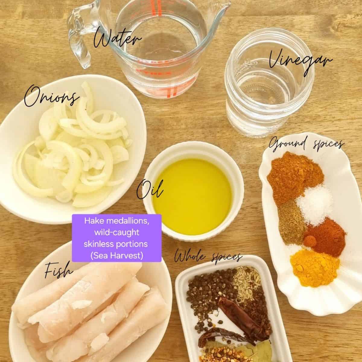 Ingredients for homemade South African pickled fish, labeled and ready for cooking