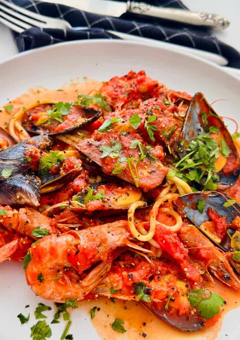 marinara seafood with mussels and shrimp in a tomato sauce