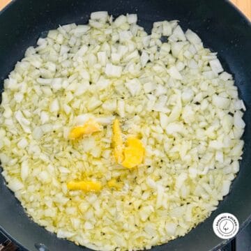 onions frying in pan with butter