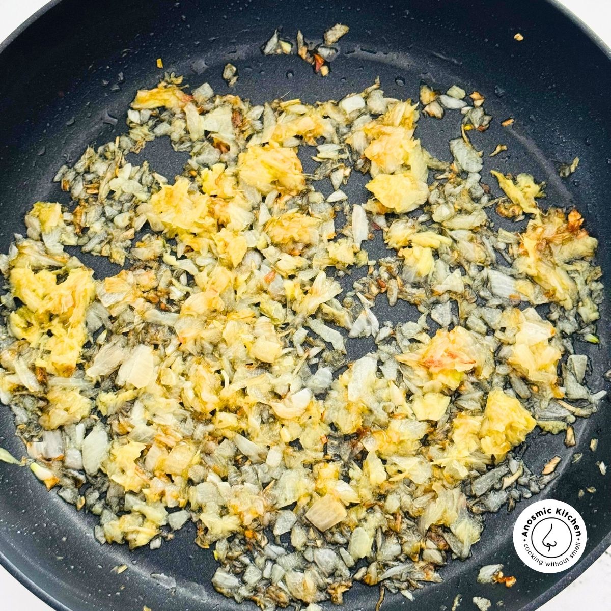 fried onion, garlic ginger in pan chickpea curry