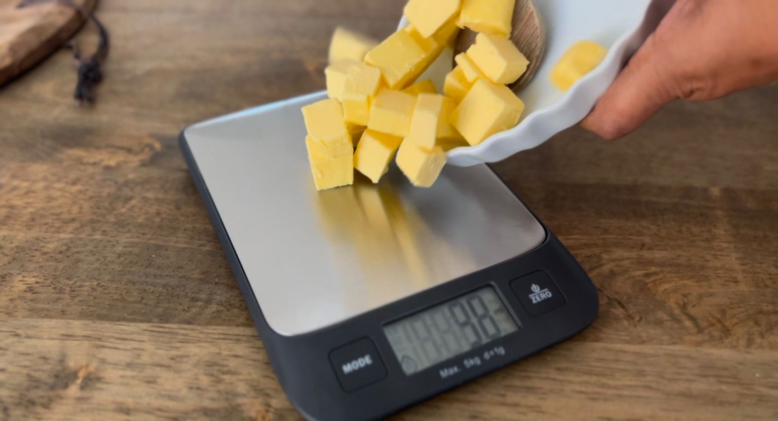 weighing cold butter for simple scones recipe
