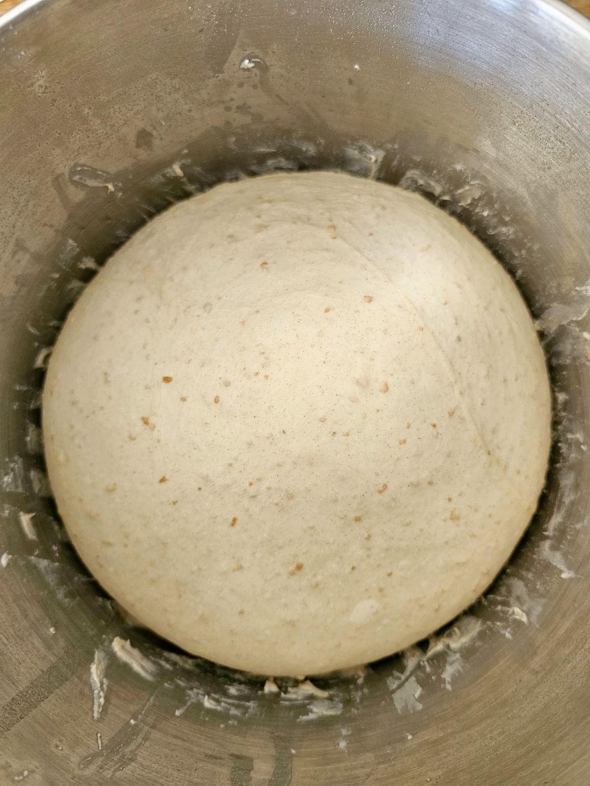 round dough ball in a bowl for naan bread recipe