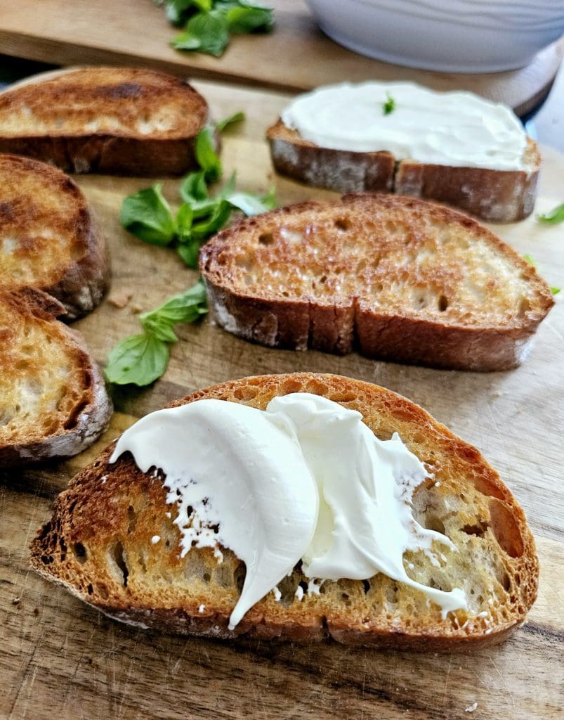 toasted slices of bread with mascarpone cheese