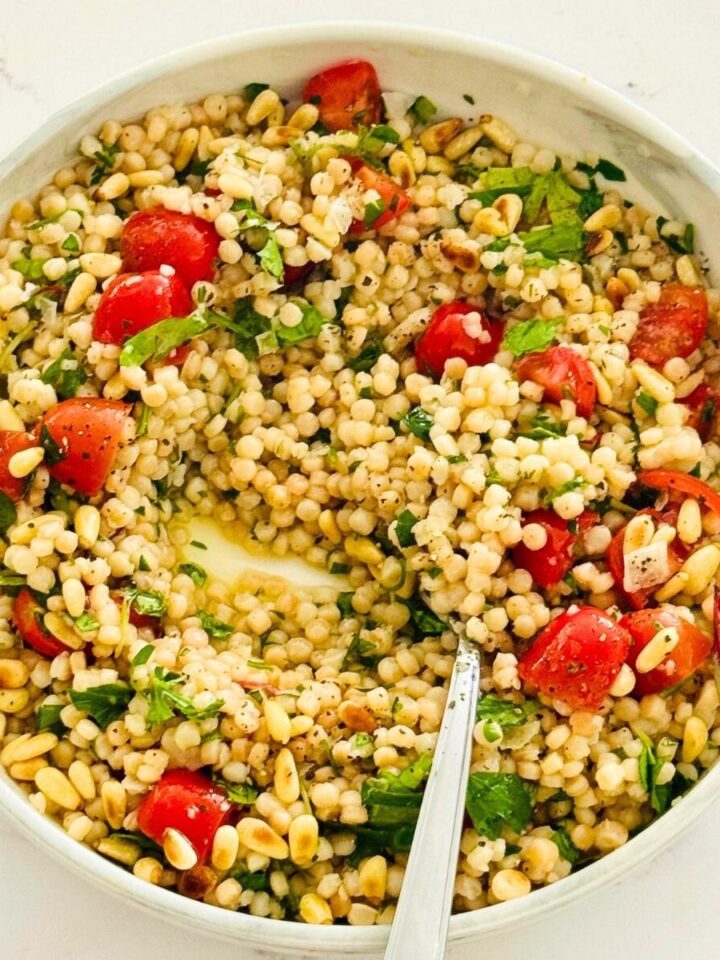 pearl couscous with cherry tomatoes and pine nuts