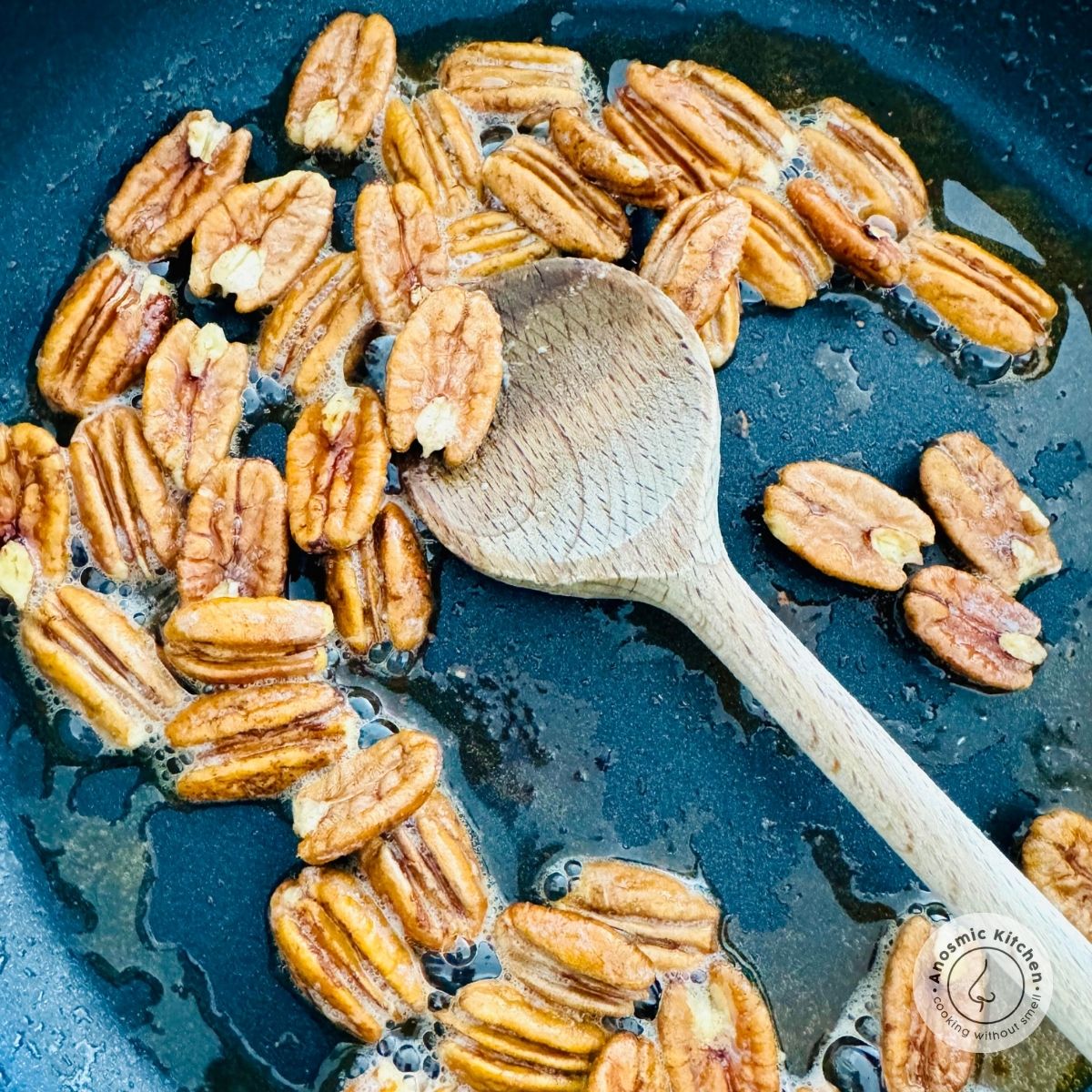 toasting pecans in butter for christmas wreath salad 