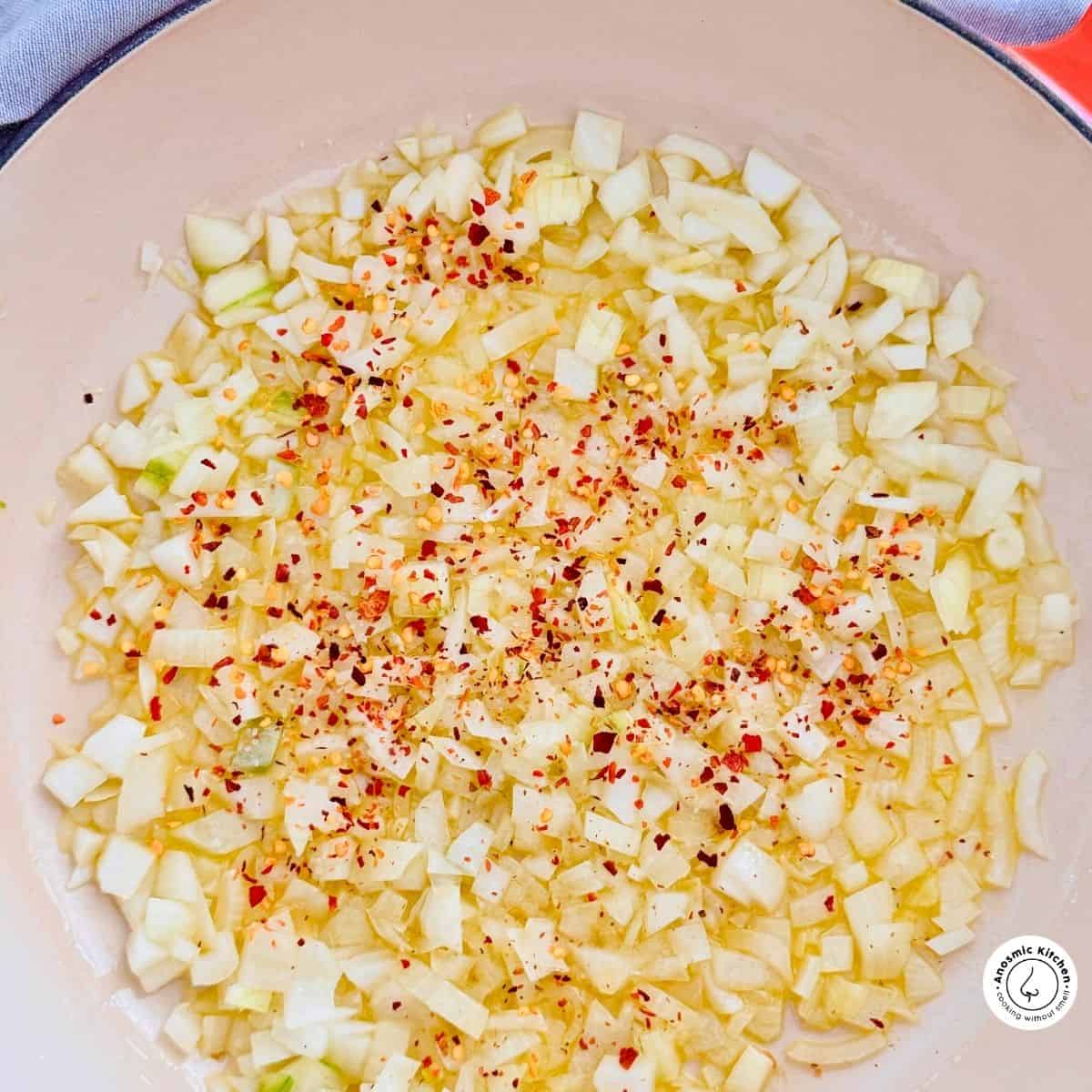 frying onions in a pan