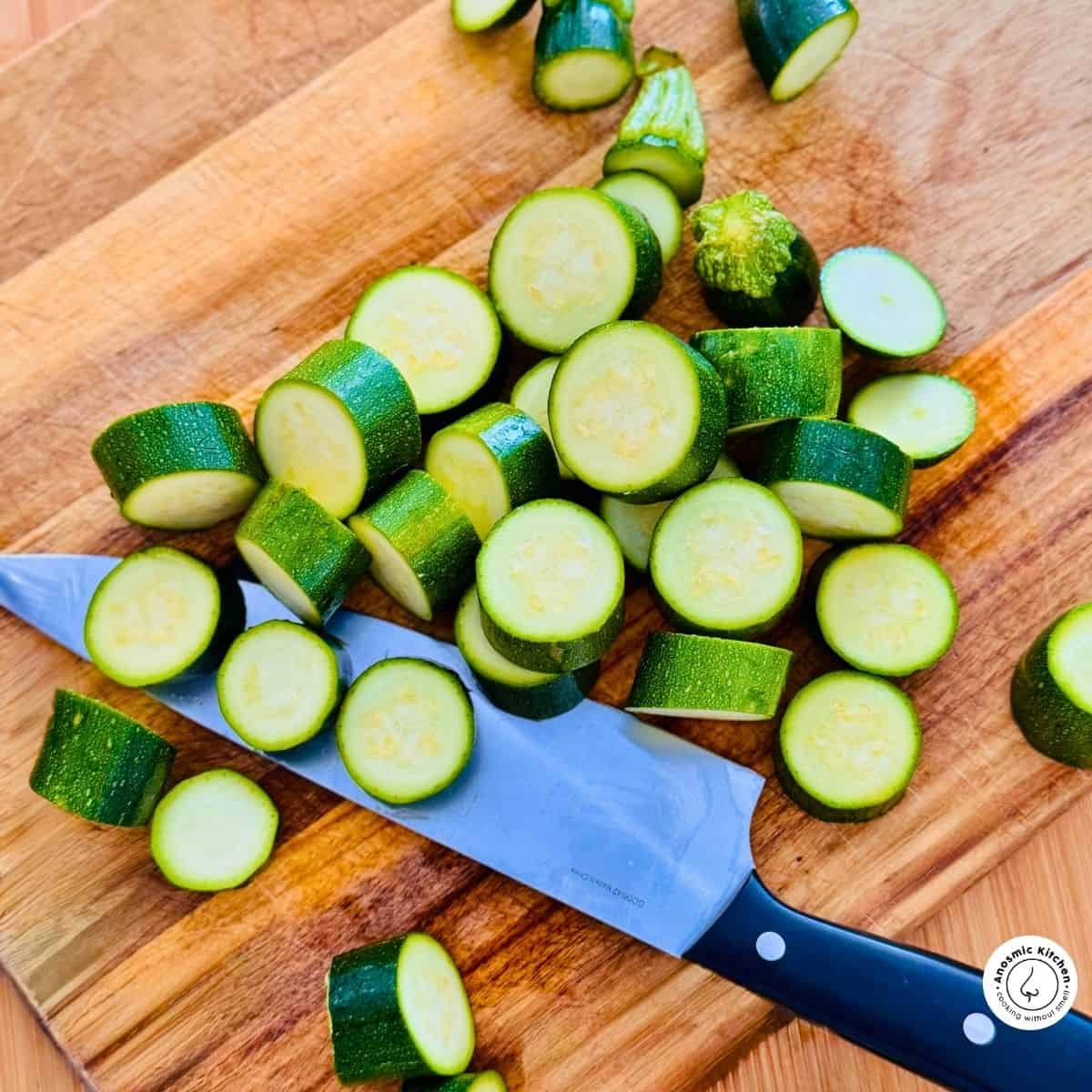 sliced zucchini on a board