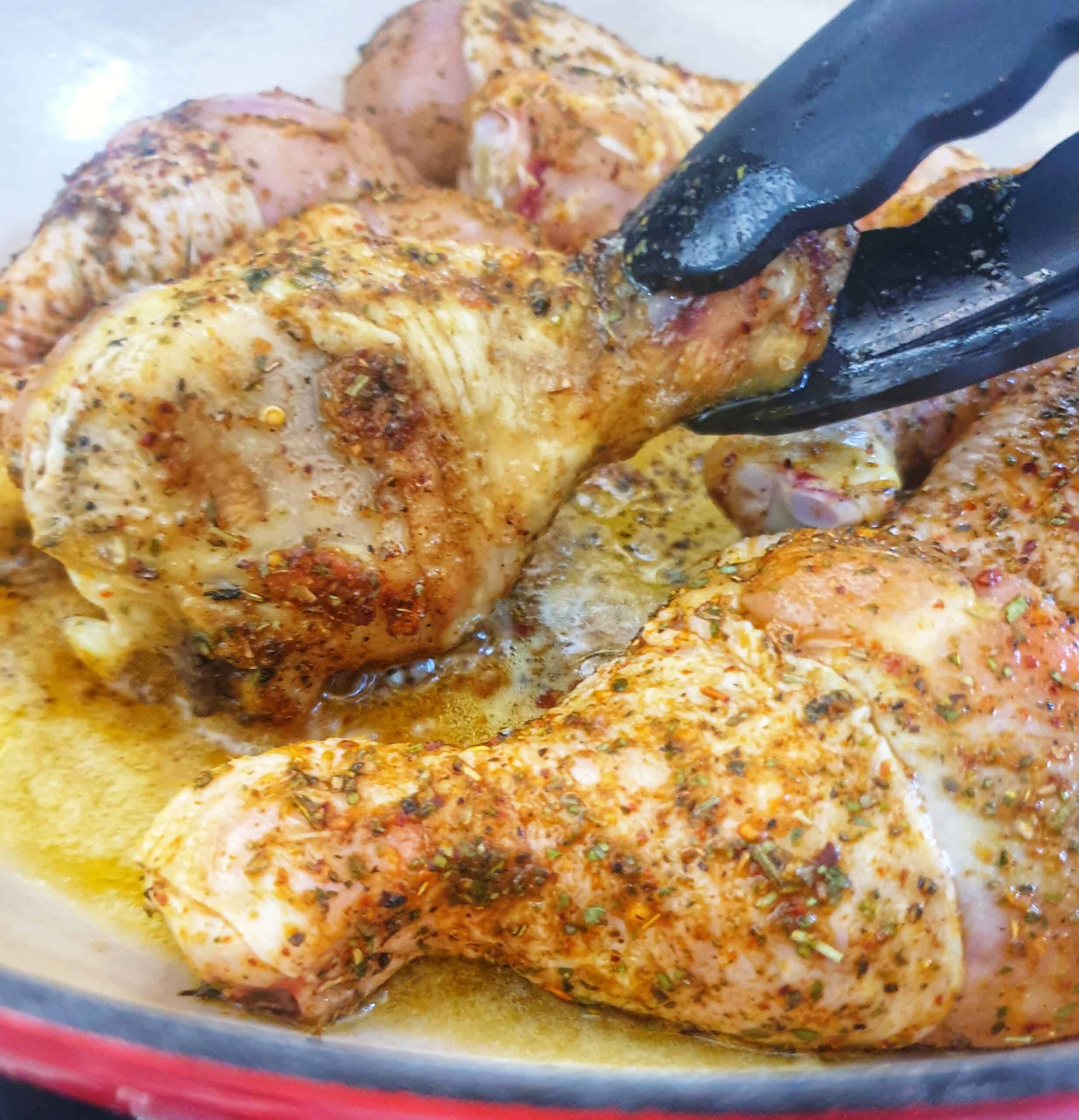 chicken frying in pan