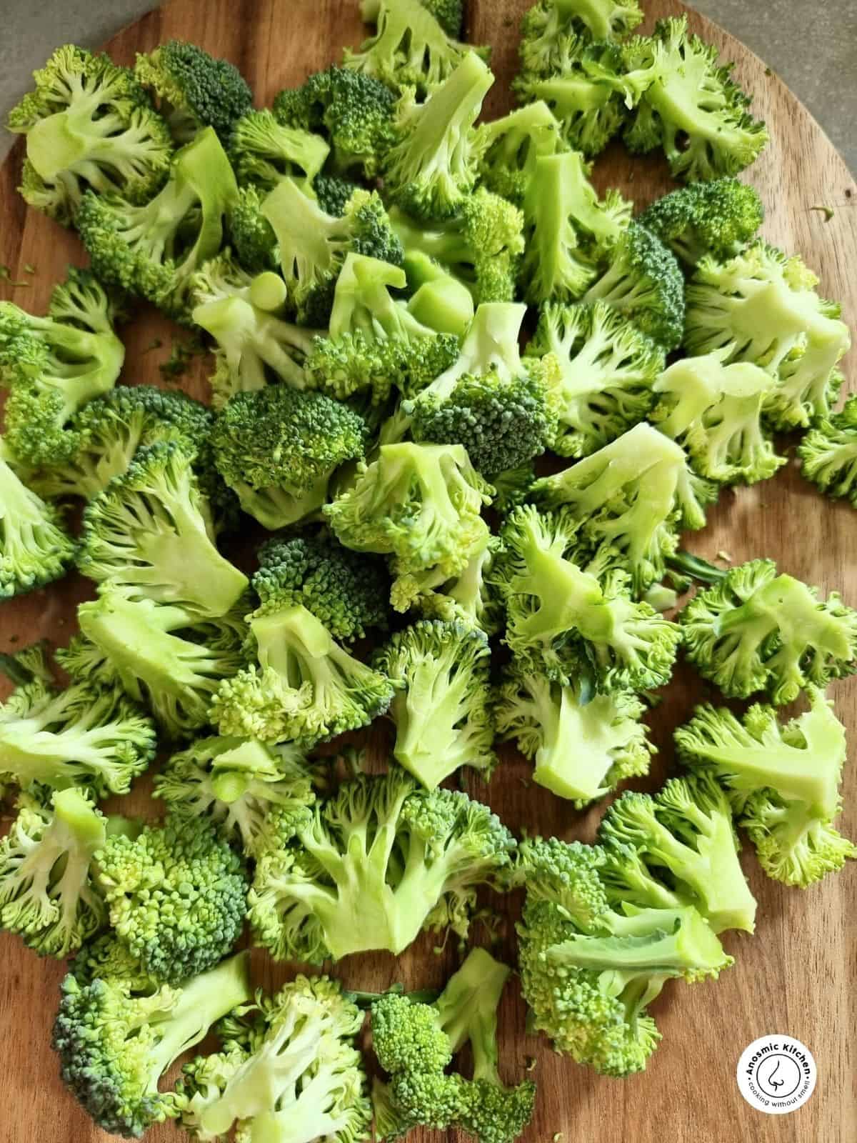 broccoli pieces cut on a board