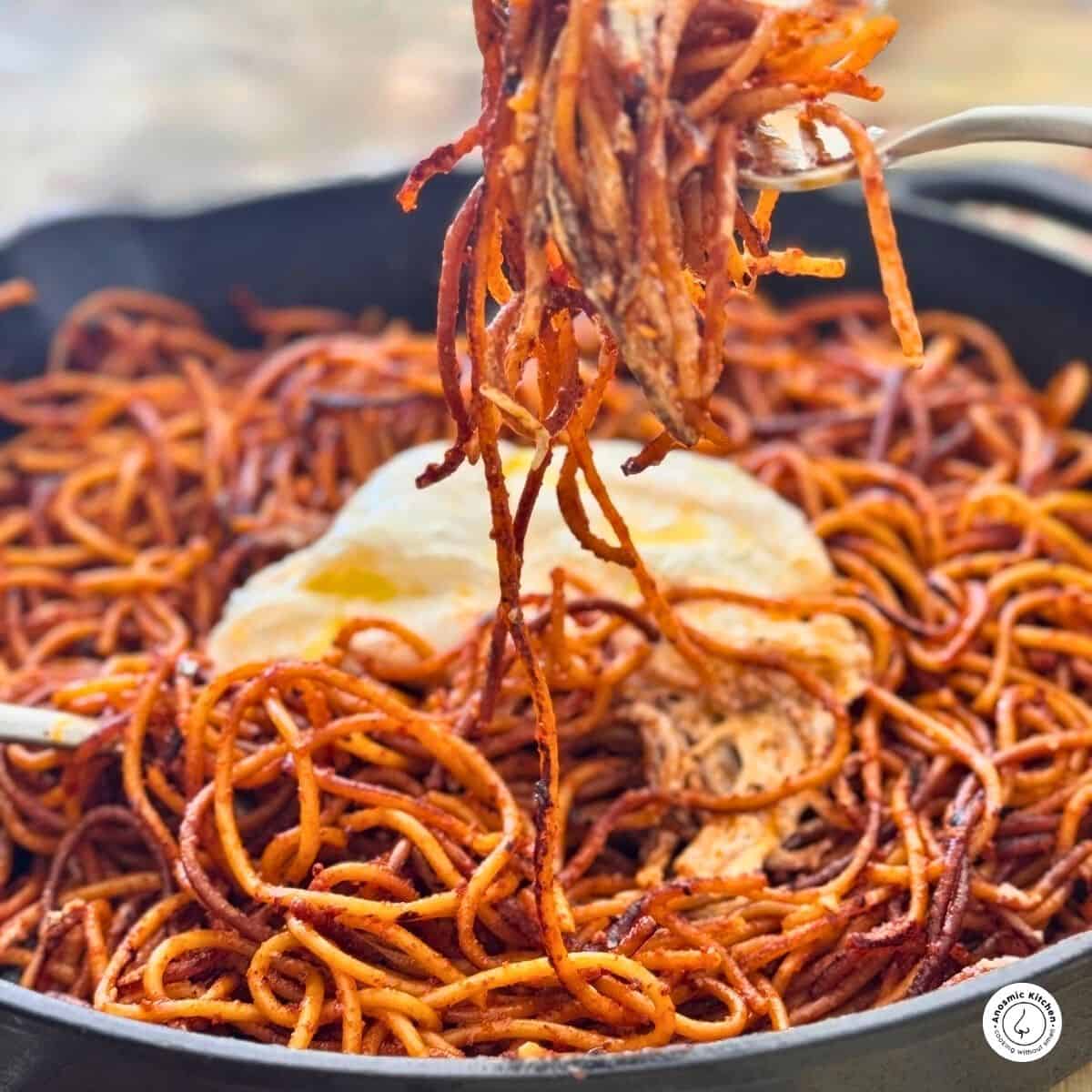 assassin's spaghetti Italian recipe with burnt pasta and burrata