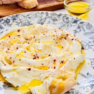 mascarpone cheese on a black and white floral plate