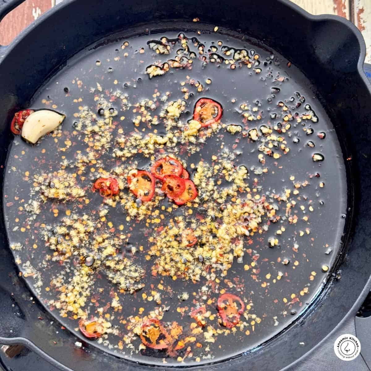 aromatics in oil on a skillet