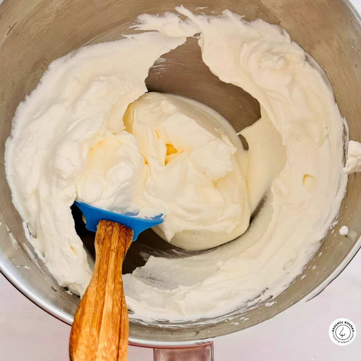 mascarpone and ricotta mixed in a bowl 