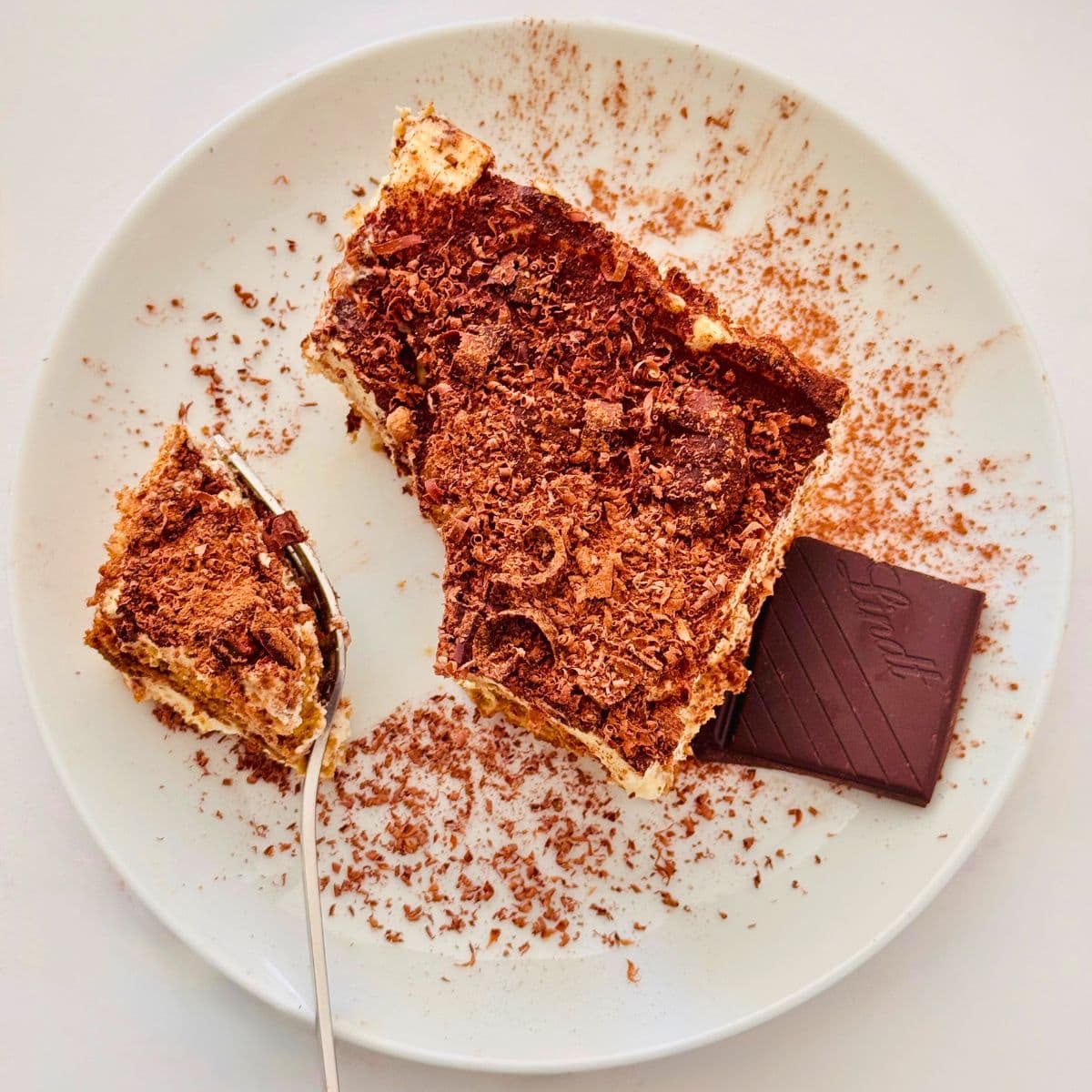 tiramisu with dark chocolate on a plate