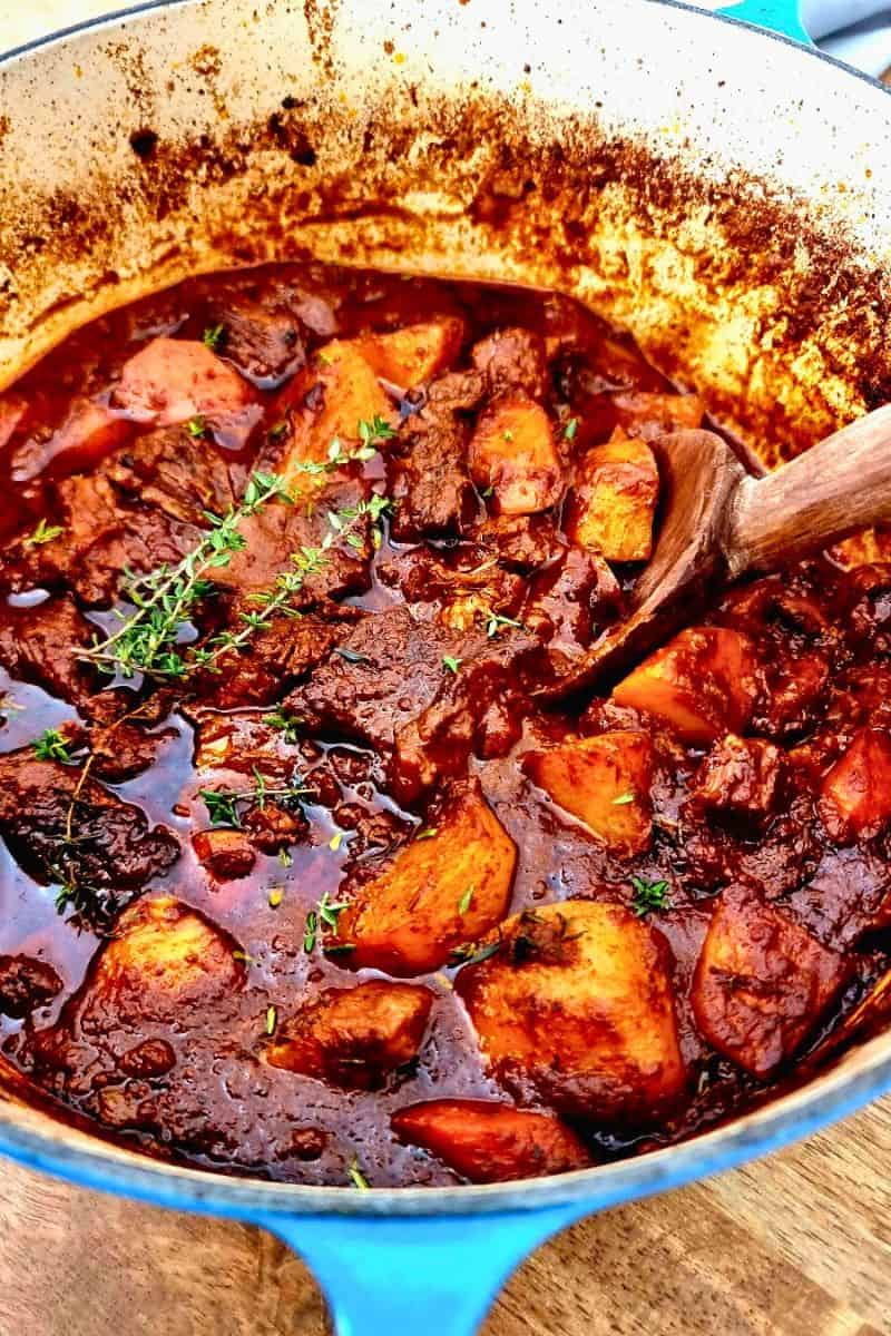 Chunky beef stew in chipotle sauce with vegetables and smoky broth