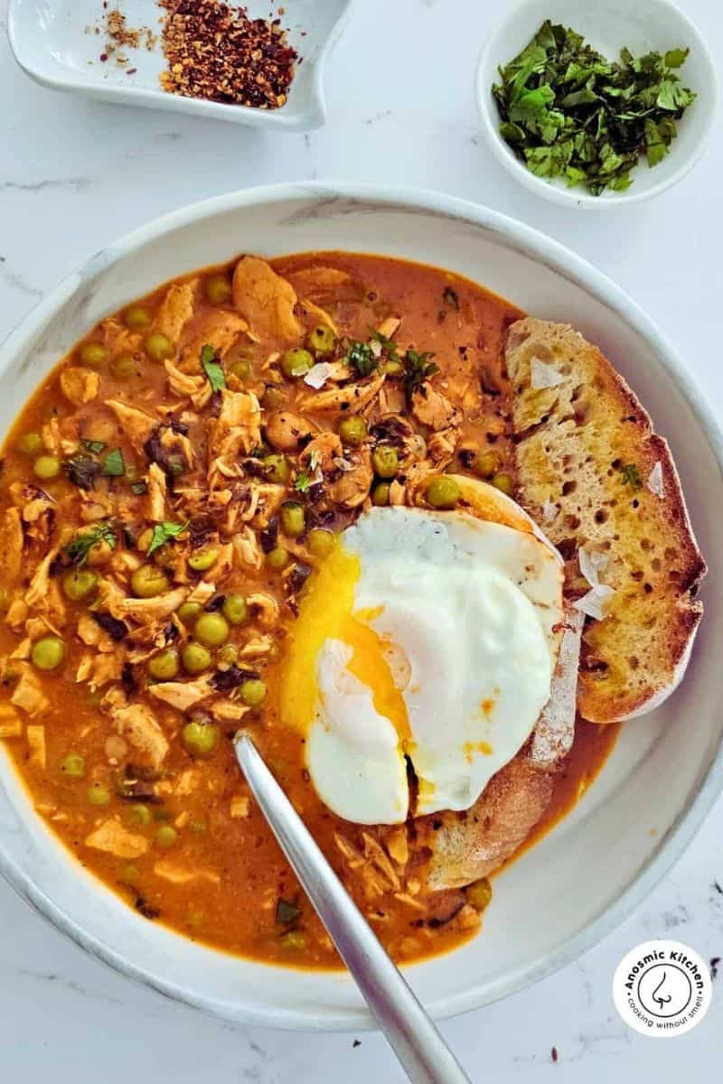 Leftover bean curry served soft fried egg and ciabatta bread.