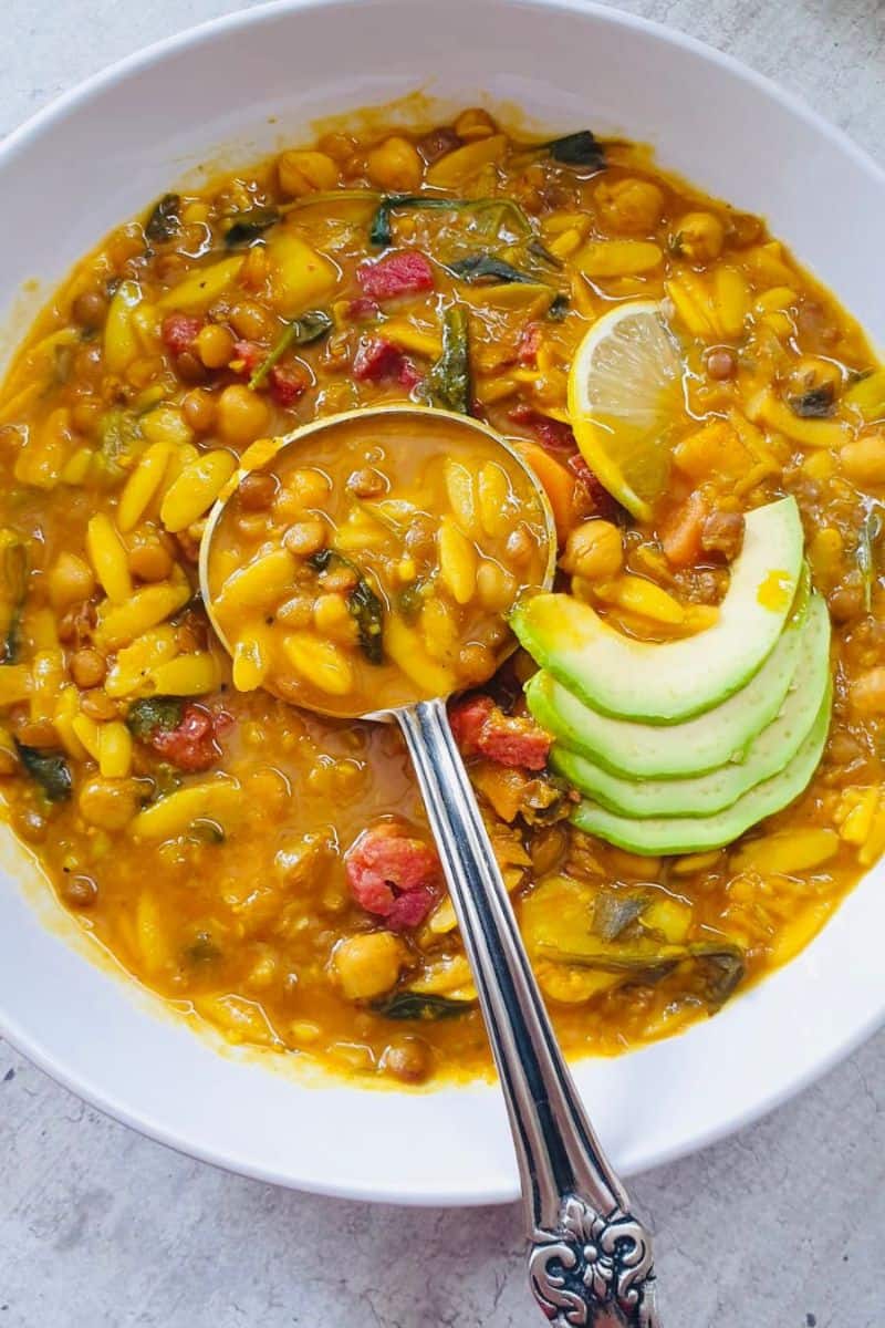 Spiced Moroccan chickpea soup with carrots, lentils, and herbs
