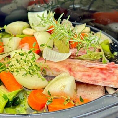 marrow bone beef broth mirepoix in a slow cooker