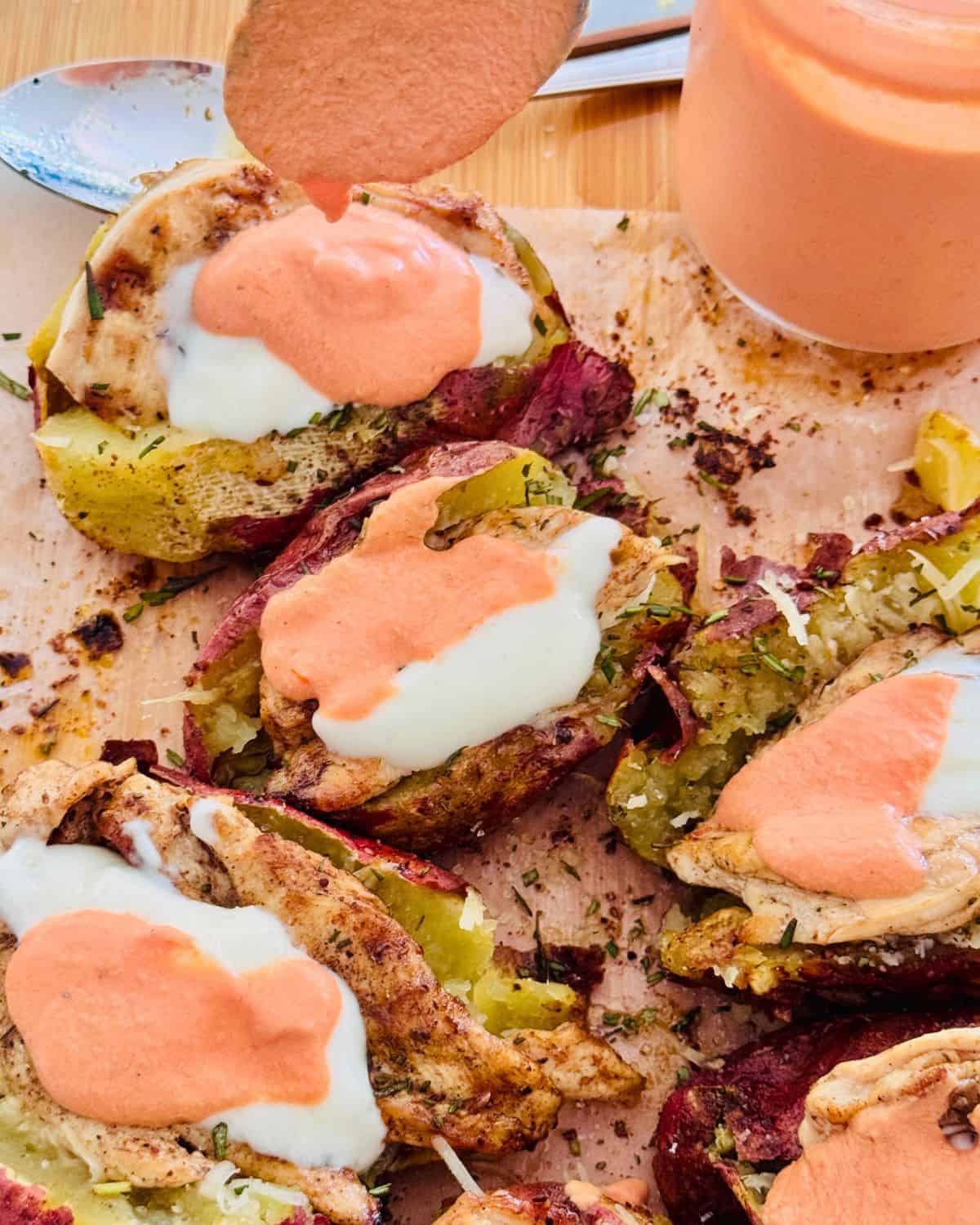 baked & stuffed sweet potatoes served with pink sauce