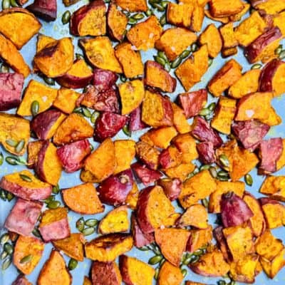 cubed and cooked sweet potatoes with pumpkin seeds
